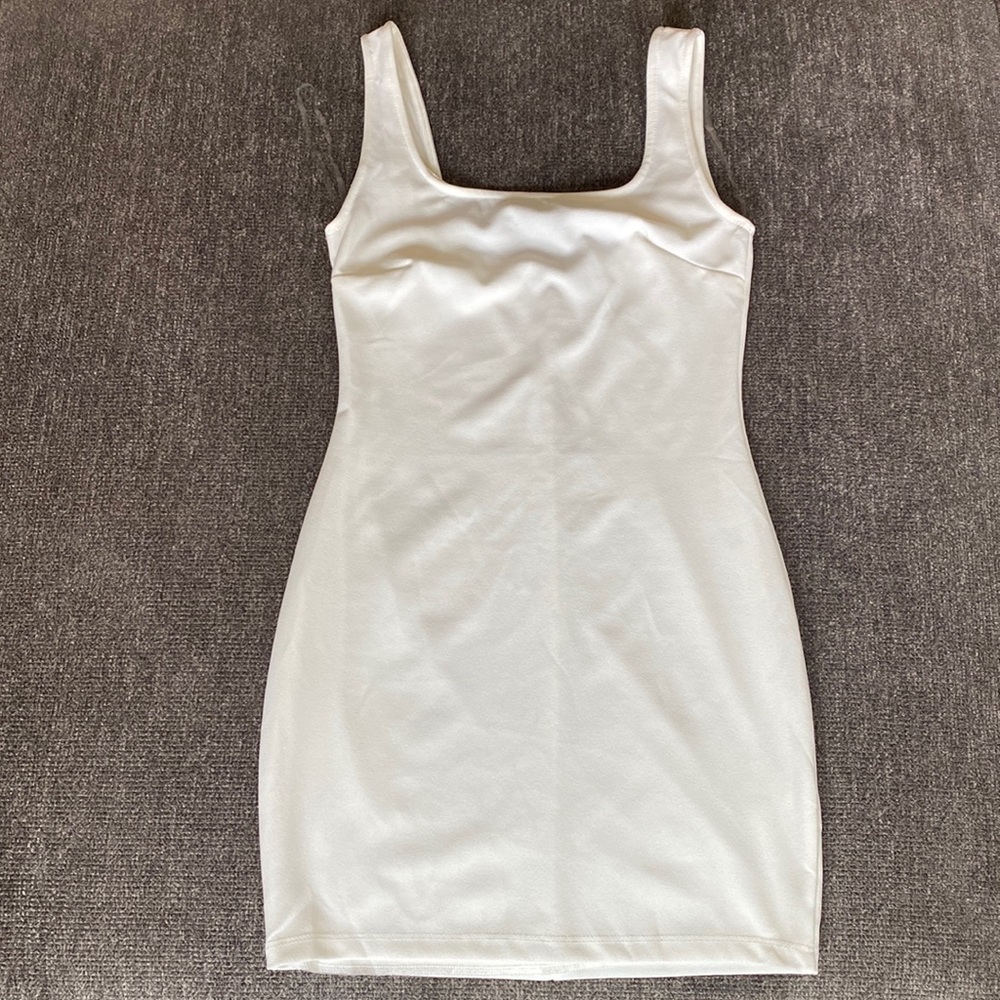 White/slight off white Mini Dress. Two Medium size dresses and one Large.